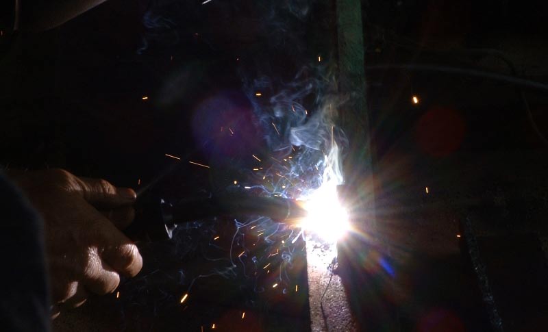 Welding with hand and spark